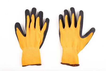 Work gloves for gardening. Accessories for people working in the garden. Light background.