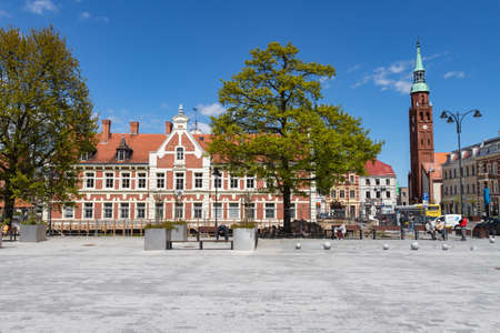 Starogard GdaÅski, pomorskie / Poland - May, 21, 2020: Old tenements on the market square in a small town. City center in Central Europe. Spring season.のeditorial素材
