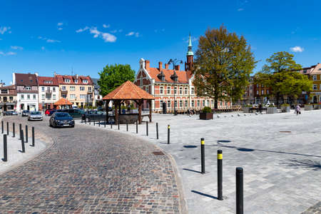 Starogard GdaÅski, pomorskie / Poland - May, 21, 2020: Old tenements on the market square in a small town. City center in Central Europe. Spring season.のeditorial素材
