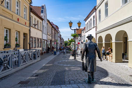 Darlowo, zachodniopomorskie / Poland - June, 4, 2020: Promenade in a small town. Old tenements in Central Europe. Spring season.のeditorial素材