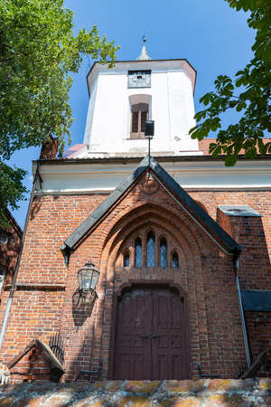 Dzierzgon, pomorskie / Poland-June 26, 2020.:A historic church in a small town. Catholic temple in Central Europe. Summer season.のeditorial素材