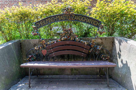 Chelmno, kujawsko-pomorskie / Poland-June 25, 2020.: Bench of lovers in the city center. A place to relax in the park. Summer season.のeditorial素材