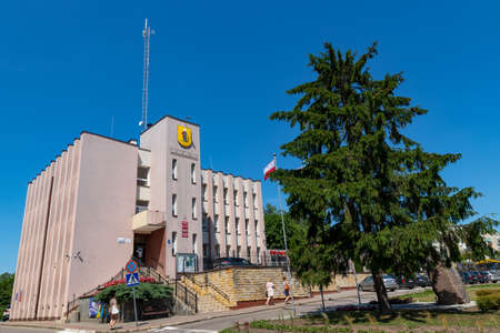 Dzierzgon, pomorskie / Poland-June 26, 2020.:Building building of the city authorities in a small town. Town hall in the center of the city in Central Europe. Summer season.のeditorial素材