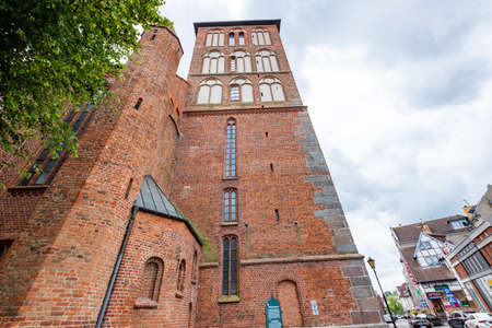 Kolobrzeg, zachodniopomorskie / Poland-July, 9, 2020: Catholic church in Central Europe. Catholic temple for Christians. Summer season.のeditorial素材