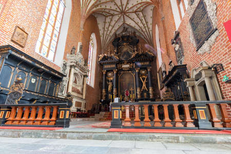Chelmza, kujawsko pomorskie / Poland-July, 15, 2020: Historic interiors of a large Gothic church. Christian temple in the city center. Summer season.のeditorial素材