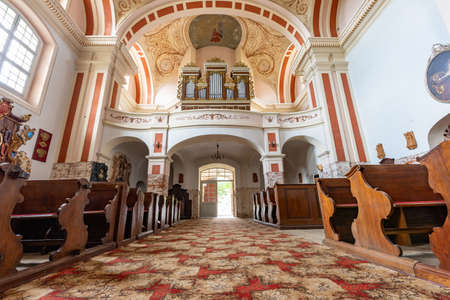 Pyzdry, wielkopolskie / Poland - July, 22, 2020: Interior of a historic Catholic church. Christian temple in Central Europe. Summer season.のeditorial素材