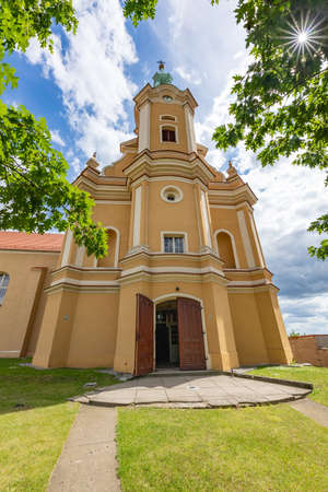 Pyzdry, wielkopolskie / Poland - July, 22, 2020: A former monastery church in a small town. Christian temple in Central Europe. Summer season.のeditorial素材