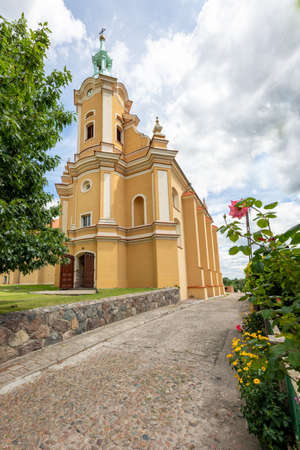 Pyzdry, wielkopolskie / Poland - July, 22, 2020: A former monastery church in a small town. Christian temple in Central Europe. Summer season.のeditorial素材