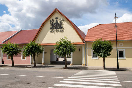 Pyzdry, wielkopolskie / Poland - July, 22, 2020: Renovated buildings in the market square of a small town. Townhouses in Central Europe. Summer season.のeditorial素材