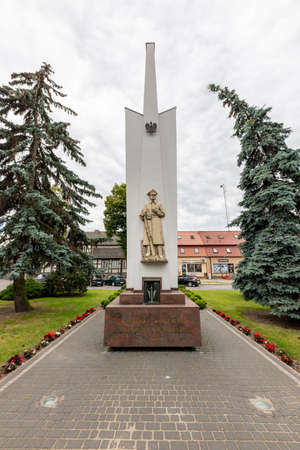 Lobzenica, wielkopolskie / Poland - July, 23, 2020: Monument in the center of a small town. City center in Central Europe. Summer season.のeditorial素材