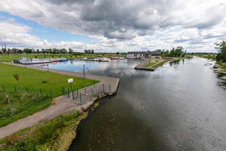 Naklo, Kujawsko Pomorskie / Poland - July, 23, 2020: A river harbor in a small town. A berth for boats sailing on rivers Season is summer.のeditorial素材