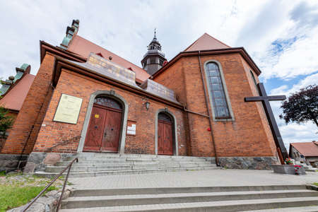 Koscierzyna, pomorskie / Poland - July, 24, 2020: Catholic Church in a small town. Christian temple in Central Europe. Summer season.のeditorial素材