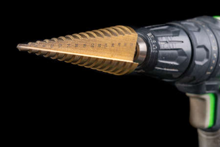 Screwdriver with a cone bit. Accessories for small jobs. Workplace home workshop.の写真素材