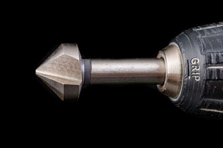 Screwdriver with countersink for metal. Accessories for small jobs. Workplace home workshop.の写真素材