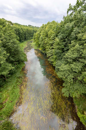 Koronowo, kujawsko pomorskie / Poland - July, 28, 2020: The Brda River seen from the narrow-gauge railway bridge. The lower part of the Brda River. Summer season.のeditorial素材