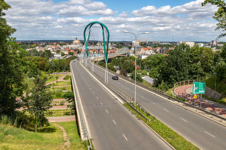 Bydgoszcz, kujawsko pomorskie / Poland - July, 30, 2020: A large bridge in Central Europe. Passage for cars and trucks across the river. Summer season.のeditorial素材