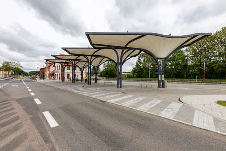 Kartuzy, pomorskie / Poland - August, 04, 2020: A railway station in a small town. Renovated buildings of the public transport station. Summer season.のeditorial素材