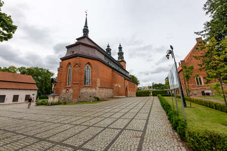 Kartuzy, pomorskie / Poland - August, 04, 2020: Collegiate school in a small town. Old Christian Church in Central Europe. Summer season.のeditorial素材