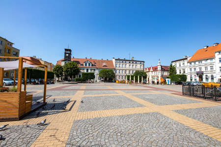 Bialogard, Zachodniopomorskie / Poland - August, 7, 2020: Small Town Market in Central Europe. Old tenement houses and buildings in the city. Spring season.のeditorial素材