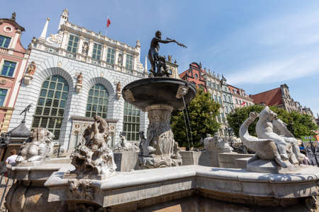 Gdansk, pomorskie / Poland - August, 8 2020: Neptune Monument in Gdansk. Old Town in a large Central European city. Summer season.のeditorial素材