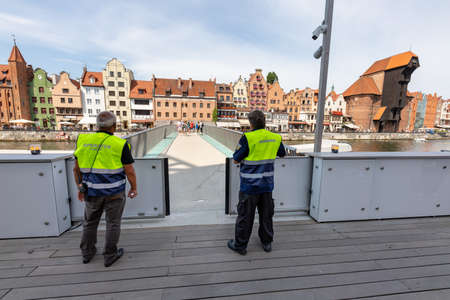 Gdansk, pomorskie / Poland - August, 8, 2020: New footbridge. A crossing for tourists in the Old Town in Gdansk. Summer season.のeditorial素材