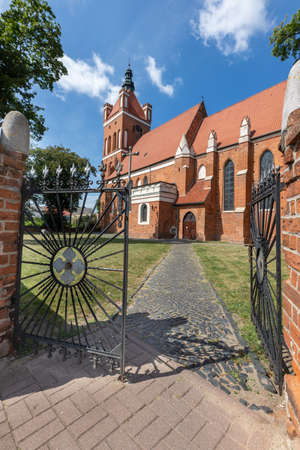 Golub Dobrzyn, Kujawsko-pomorskie / Poland - August, 18, 2020: Catholic Church in a small town. Christian temple in Central Europe. Summer season.のeditorial素材