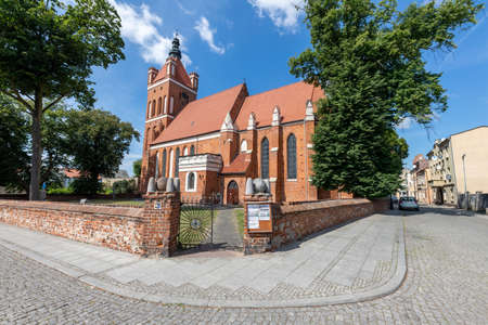 Golub Dobrzyn, Kujawsko-pomorskie / Poland - August, 18, 2020: Catholic Church in a small town. Christian temple in Central Europe. Summer season.のeditorial素材