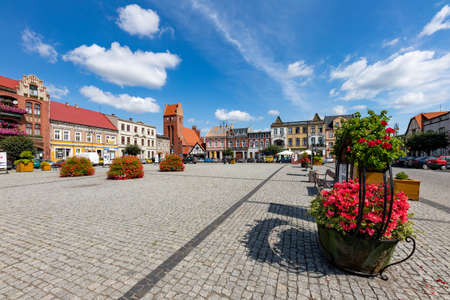 Golub Dobrzyn, Kujawsko-pomorskie / Poland - August, 18, 2020: The market of a small town in Central Europe. City center and old residential buildings. . Summer season.のeditorial素材