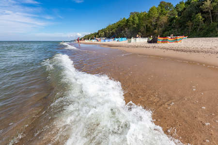 Pobierowo, Zachodnio-pomorskie / Poland - August, 29, 2020: A screen protecting people resting at the seaside. People enjoying the beach by the sea. Summer season.のeditorial素材
