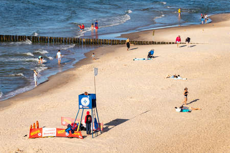 Trzesacz, Zachodniopomorskie / Poland - August, 29, 2020: Lifeguard on a sea beach in Central Europe. The swimming pool is guarded by a lifeguard. Summer season.のeditorial素材