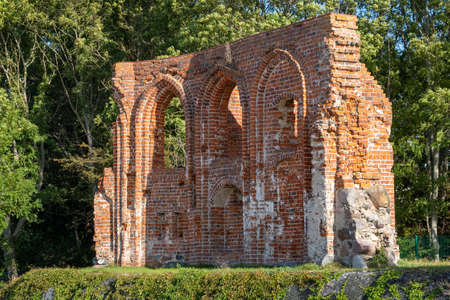 Trzesacz, Zachodniopomorskie / Poland - August, 29, 2020: Ruins of the church on the Baltic Sea. Brick building damaged by waves and storms. Summer season.のeditorial素材
