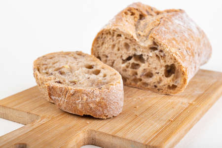 Tasty fresh bun and canned meat. A modest food ration for the prisoner. Light background.の写真素材