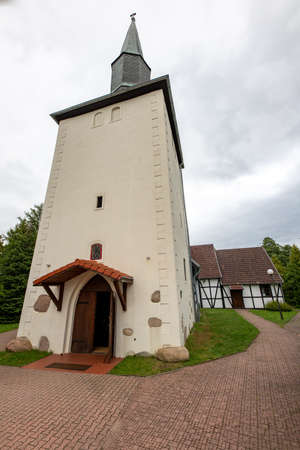 Debnica Kaszubska, Pomorskie / Poland - September, 08, 2020: Catholic Church in the center of a small village in Pomerania. Brick Christian temple. Autumn season.のeditorial素材