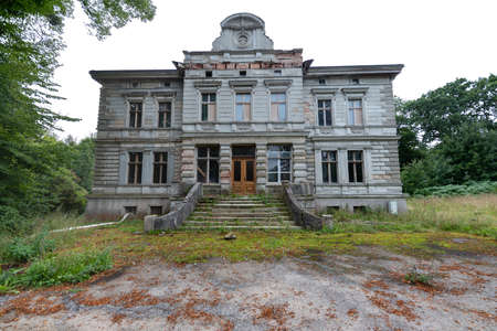 Krzywan, pomorskie / Poland - September, 08, 2020: Old ruined palace in the center of the village. Historic brick building in Central Europe. Autumn season.のeditorial素材
