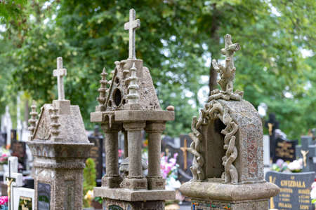 Sliwice, kujawsko pomorskie / Poland - September, 11, 2020: Old tombstones in a cemetery in a small village. The graves of the last century in Central Europe. Autumn season.のeditorial素材