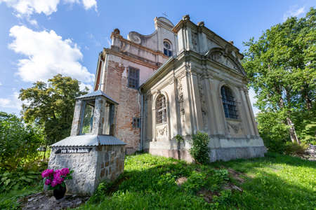 Krag, zahodniopomorskie / Poland - September, 10, 2020: Old cemetery chapel built next to the castle. Funeral chapel transformed into a church. Autumn season.のeditorial素材