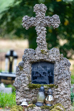 Sliwice, kujawsko pomorskie / Poland - September, 11, 2020: Old tombstones in a cemetery in a small village. The graves of the last century in Central Europe. Autumn season.のeditorial素材