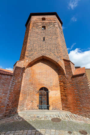 Lebork, Pomorskie / Poland - September, 09, 2020: Old city walls in a small historic town in Pomerania. Brick tower. Autumn season.のeditorial素材