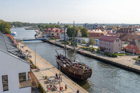 Darlowko, Zachodniopomorskie / Poland - September, 12, 2020: A fishing port in a small town. Seaport in Central Europe. Autumn season.のeditorial素材