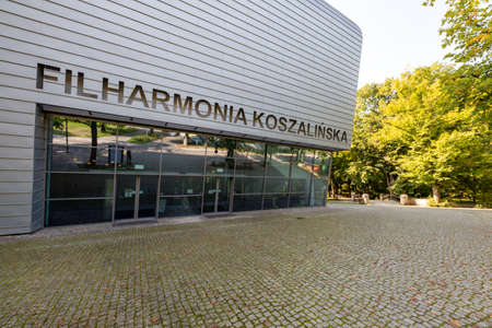 Koszalin, Zachodniopomorskie / Poland - September, 16, 2020: Philharmonic building in a small town in Pomerania. A modern form of architecture. Autumn season.のeditorial素材