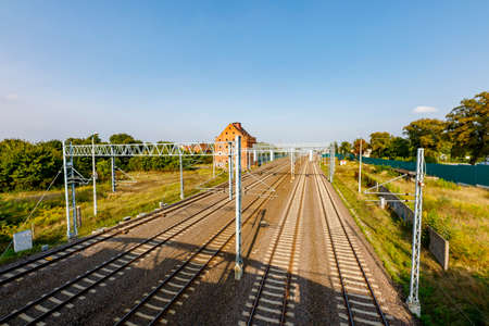 Prabuty, Pomorskie / Poland - September, 25, 2020: A railway line in a small town. Railway traction in Central Europe. Autumn season.のeditorial素材