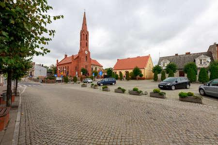 Wyrzysk, wielkopolskie / Poland - October, 01, 2020: Market square and old tenement houses in a small town in Pomerania. The center of a small town. The season is autumn.のeditorial素材