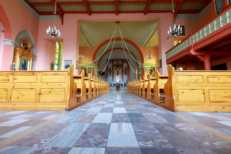 Wyrzysk, wielkopolskie / Poland - October, 01, 2020: Catholic Church in the center of a small town in Pomerania. Brick Christian temple. Autumn season.のeditorial素材
