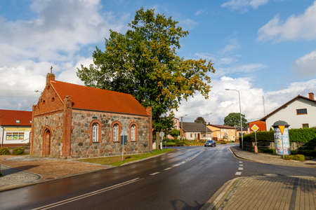 Lipka, wielkopolskie / Poland - October, 07, 2020: Old Catholic Church in the center of a small town. Brick Christian temple. Autumn season.のeditorial素材