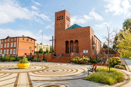 Lipka, wielkopolskie / Poland - October, 07, 2020: New Catholic Church in the center of a small town. Brick Christian temple. Autumn season.のeditorial素材