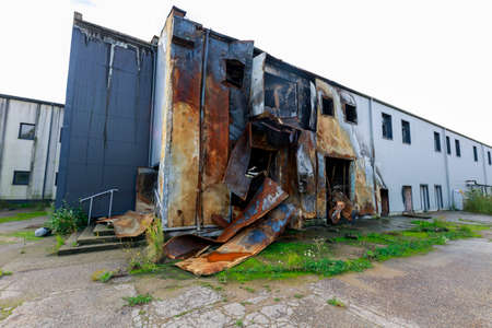 Zlocieniec, Zachodniopomorskie / Poland - October, 09, 2020: Burned down production hall. Destroyed factory in Central Europe. Autumn season.のeditorial素材