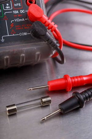 Measurement and control of glass electric fuses. Minor work in the electronics workshop. Metallic...