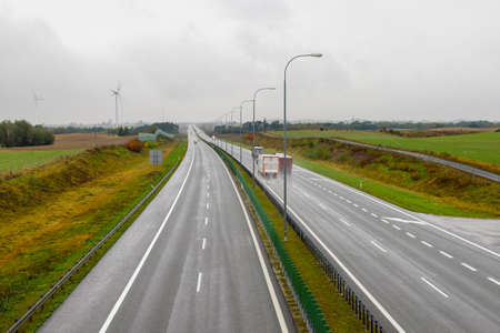 Dzialowo, kujawskopomorskie / Poland - October, 14, 2020: View of the highway in the rain from a road bridge. Two lanes on a national road in Central Europe. Autumn season.のeditorial素材