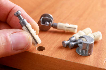 Joining chipboards with the use of specialized metal connectors. Minor carpentry work in the...