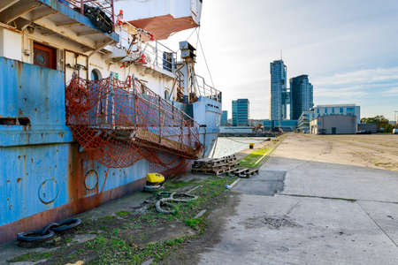 Gdynia, Pomorskie / Poland - October, 25, 2020: Old harbor wharf in Central Europe. Ships and port facilities. Autumn season.のeditorial素材
